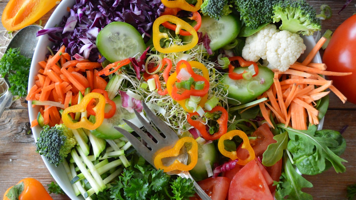 A plate of colourful raw vegetables